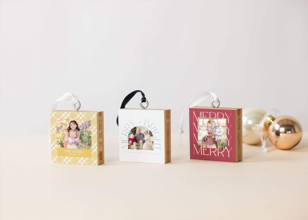 A photo featuring 3 different bamboo ornament designs. Photo ornaments are fun way to turn family photos into gifts.